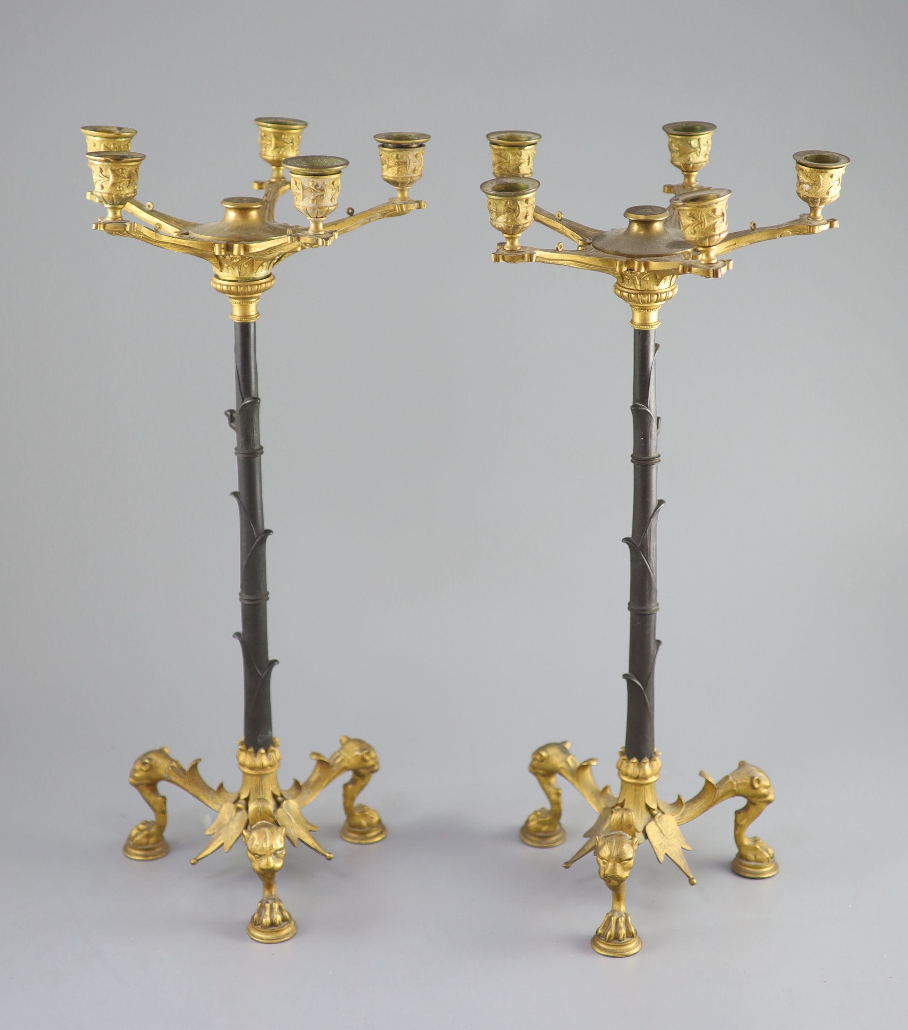 A pair of Barbedienne style five branch ormolu candelabra, 19th century, 52cm high